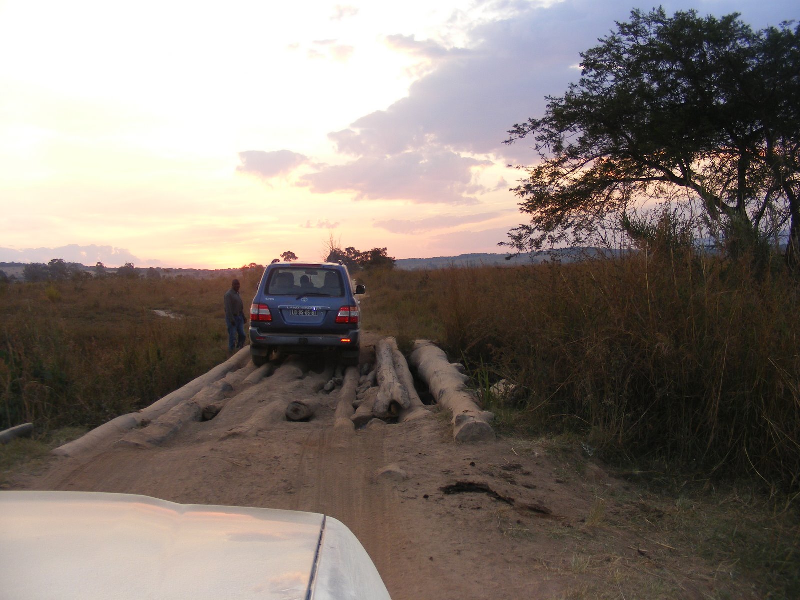 Off main roads, rough dirt tracks and makeshift bridges link farms to markets in Huambo province, Angola